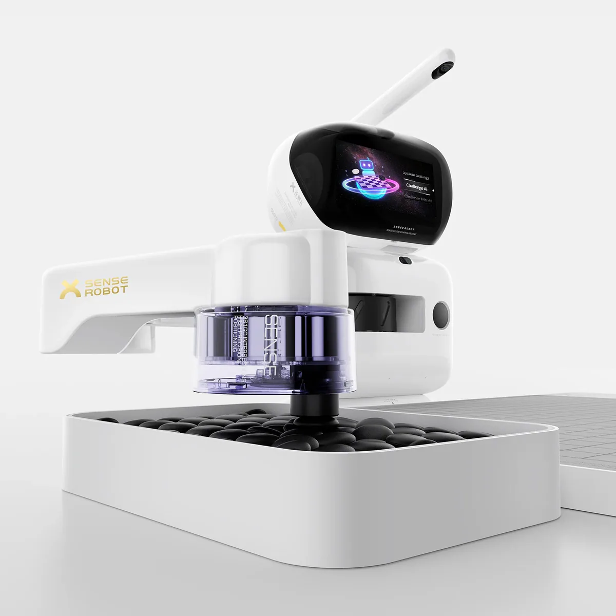 SenseRobot Go robotic arm placing a stone near a bowl